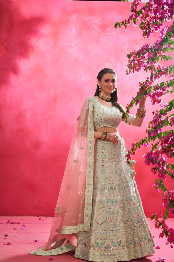 Mesmerising Pista green lehenga in silk with thread and mirror work. –  Malhotra's Indian Heritage